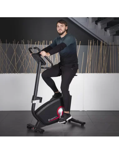 Vélo d'appartement avec système de freinage...